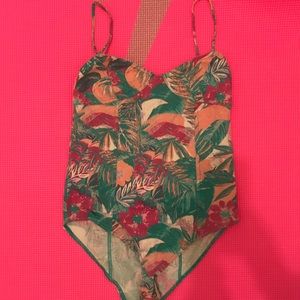 Cute pastel colored body suit